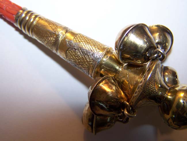 An early 19th century English Engraved Silver-Gilt Childs' Rattle, Whistle and Bells with Carved Coral Stem — image 3